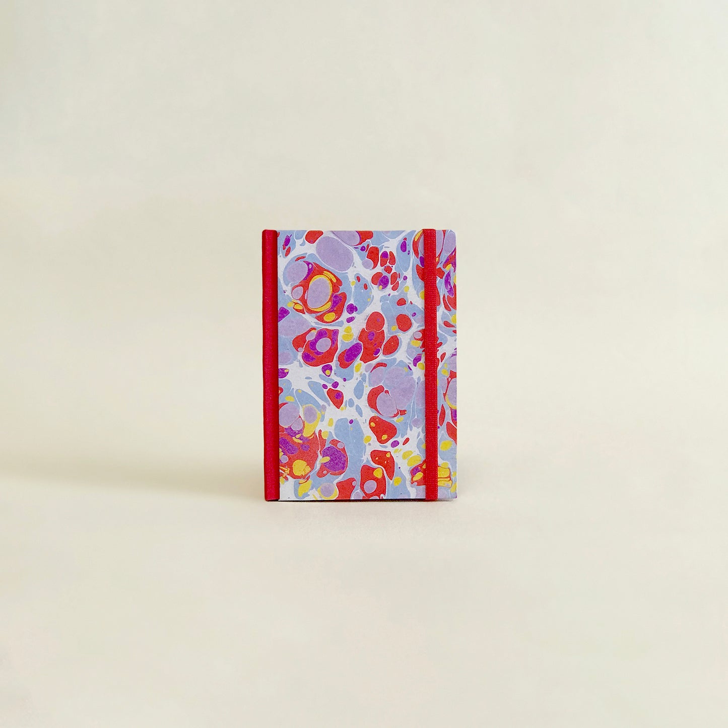 Carnet de notes marbré - rouge et violet