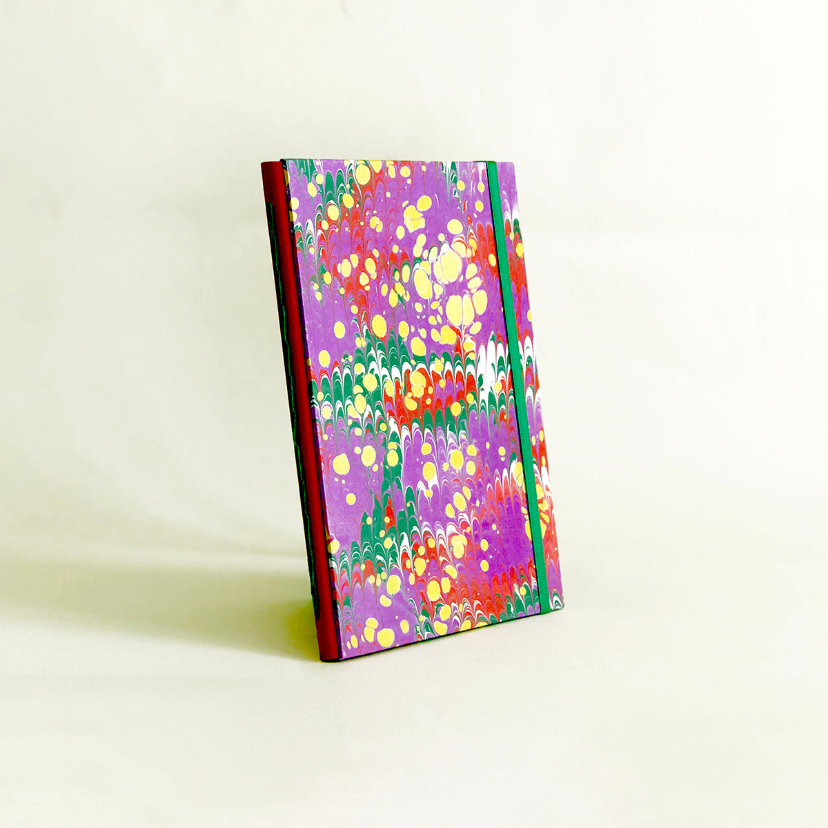 Journal marbré - violet, vert et rouge