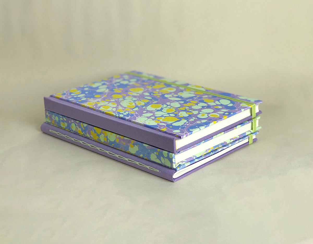 Carnets grands lilas et vert fluo