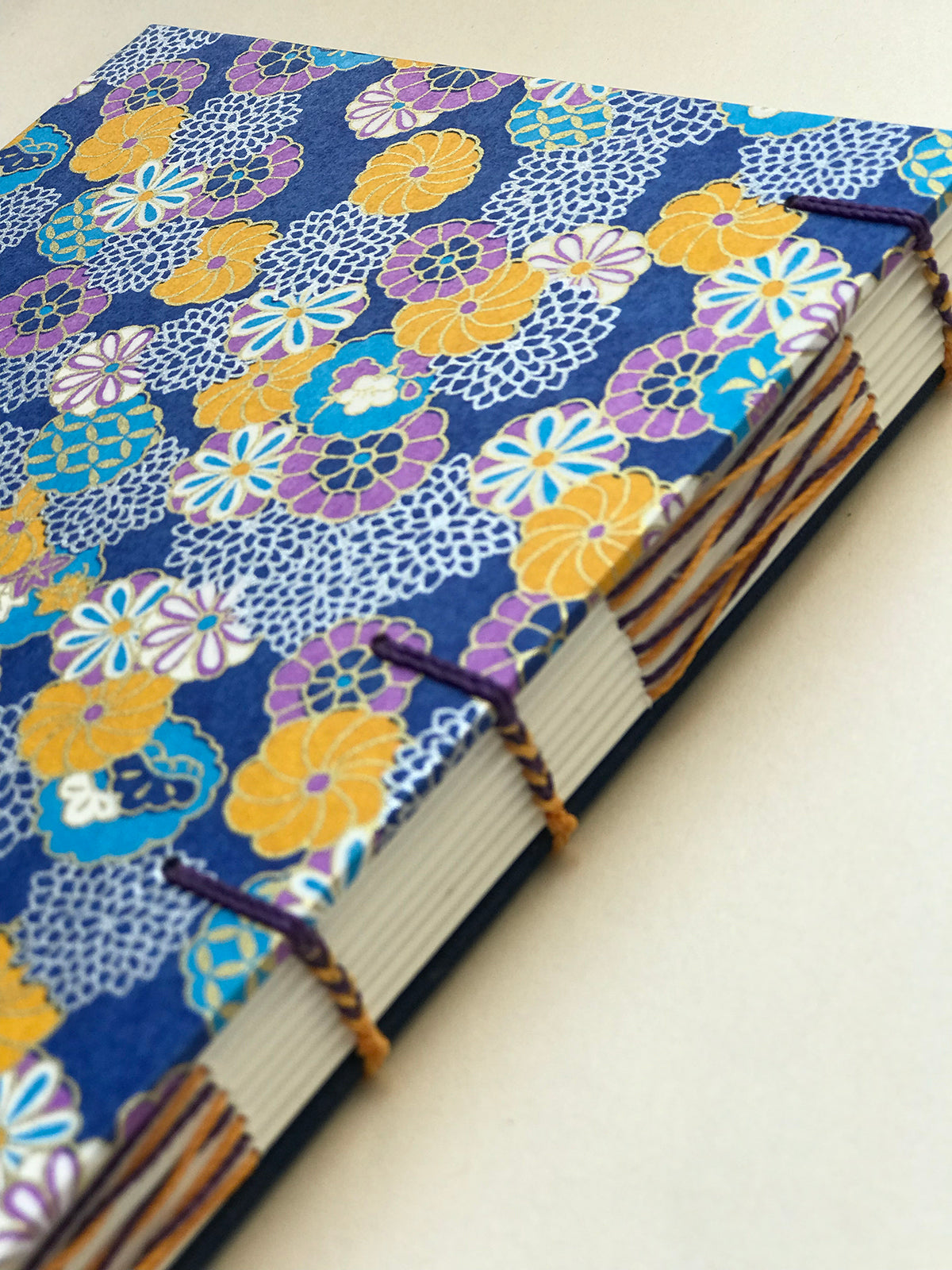 Carnet de notes fleurs orange bleu violet